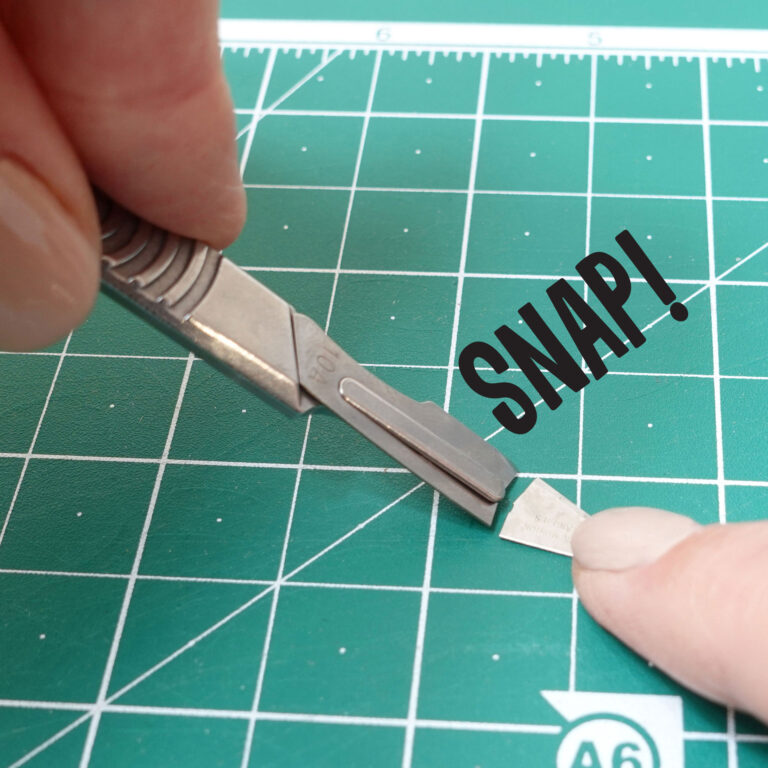 Remove a swann-moreton scalpel blade